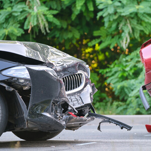 Damaged In Heavy Car Accident Vehicles After Collision On City Street Crash Site. Road Safety And Insurance Concept